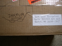 box containing donated glasses for Darfur refugees